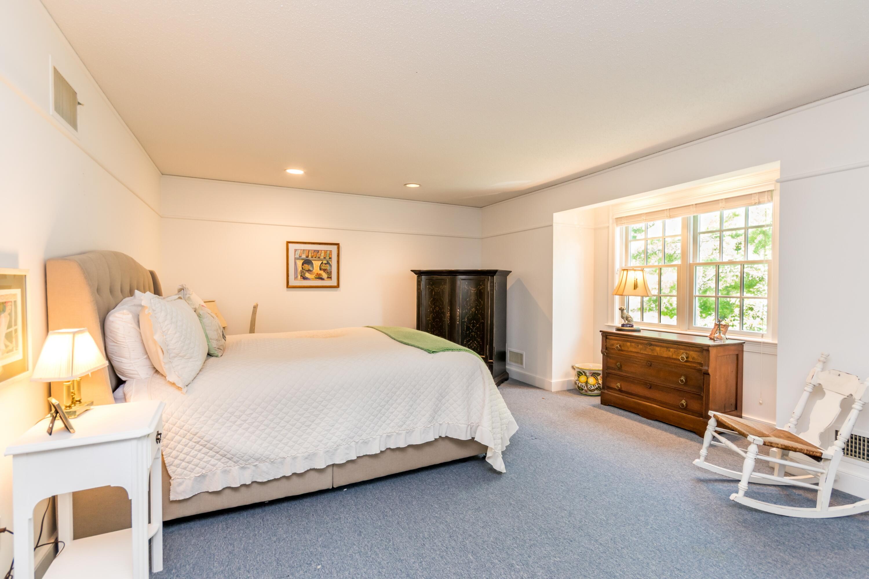 15 Hampton Court, Unit 15 Mashpee, MA 02649 - Photo 24 of 40 a bedroom with a bed and a window