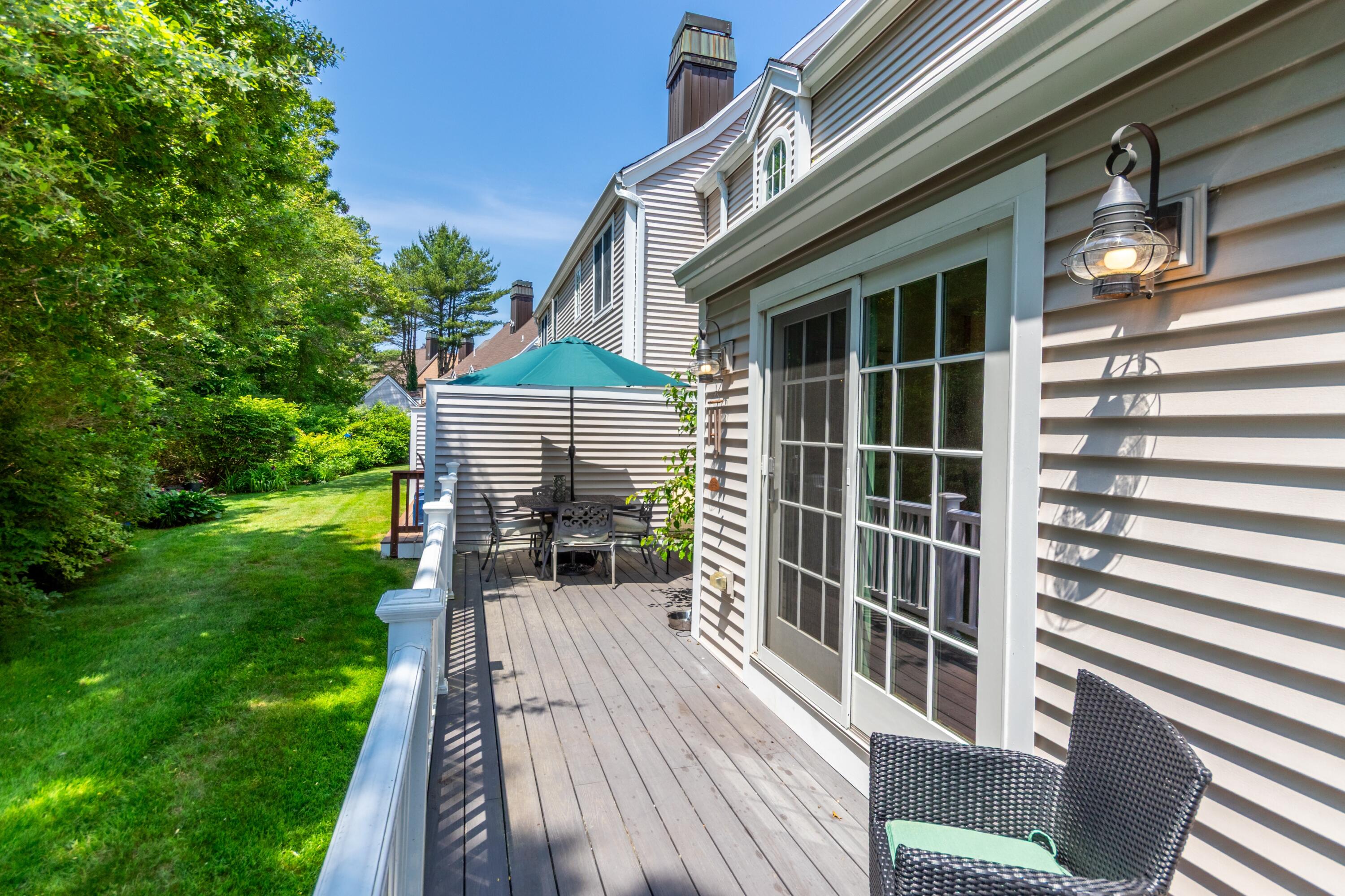 15 Hampton Court, Unit 15 Mashpee, MA 02649 - Photo 32 of 40 a view of a house with a yard