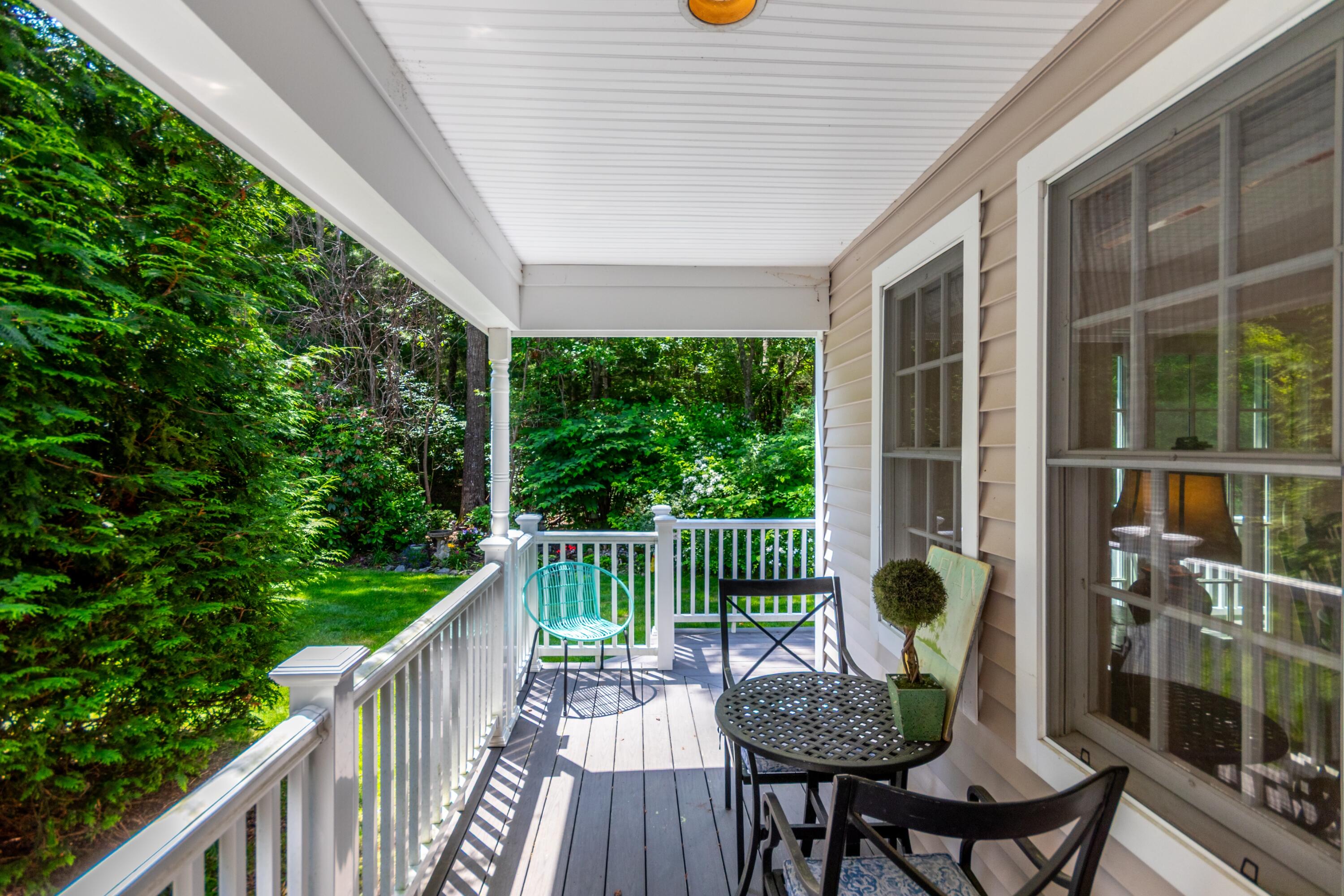 15 Hampton Court, Unit 15 Mashpee, MA 02649 - Photo 34 of 40 a view of a chair and table in the balcony