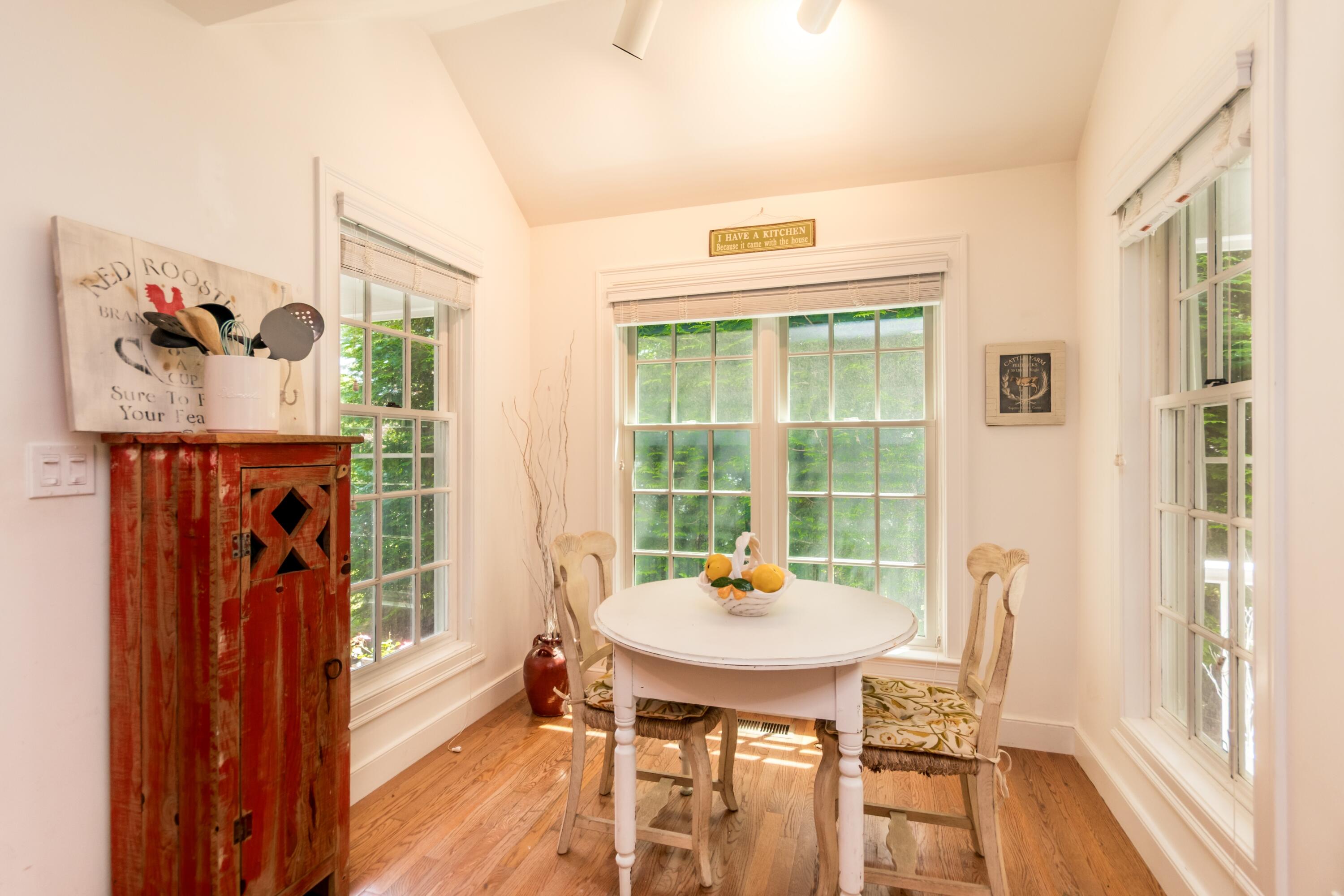 15 Hampton Court, Unit 15 Mashpee, MA 02649 - Photo 9 of 40 a view of a dining room with furniture window and outside view