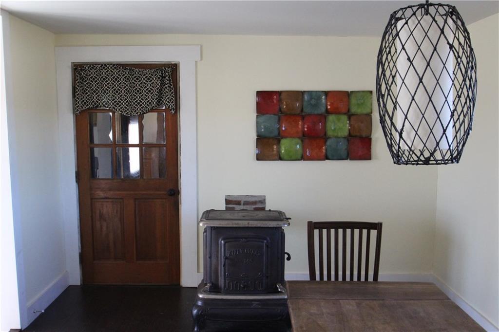 1013 North Mountain Road Jefferson, ME 04348 - Photo 6 of 22 Dining woodstove