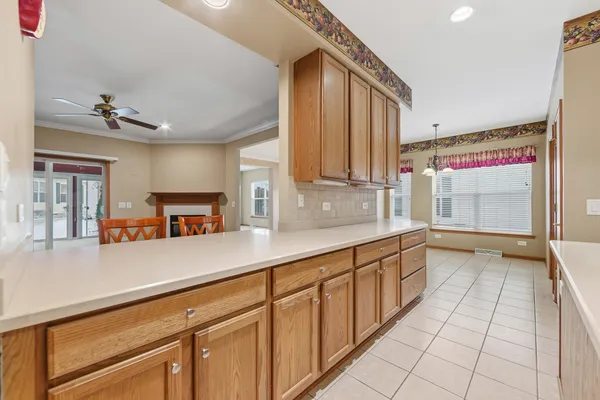 a kitchen with stainless steel appliances a sink and cabinets