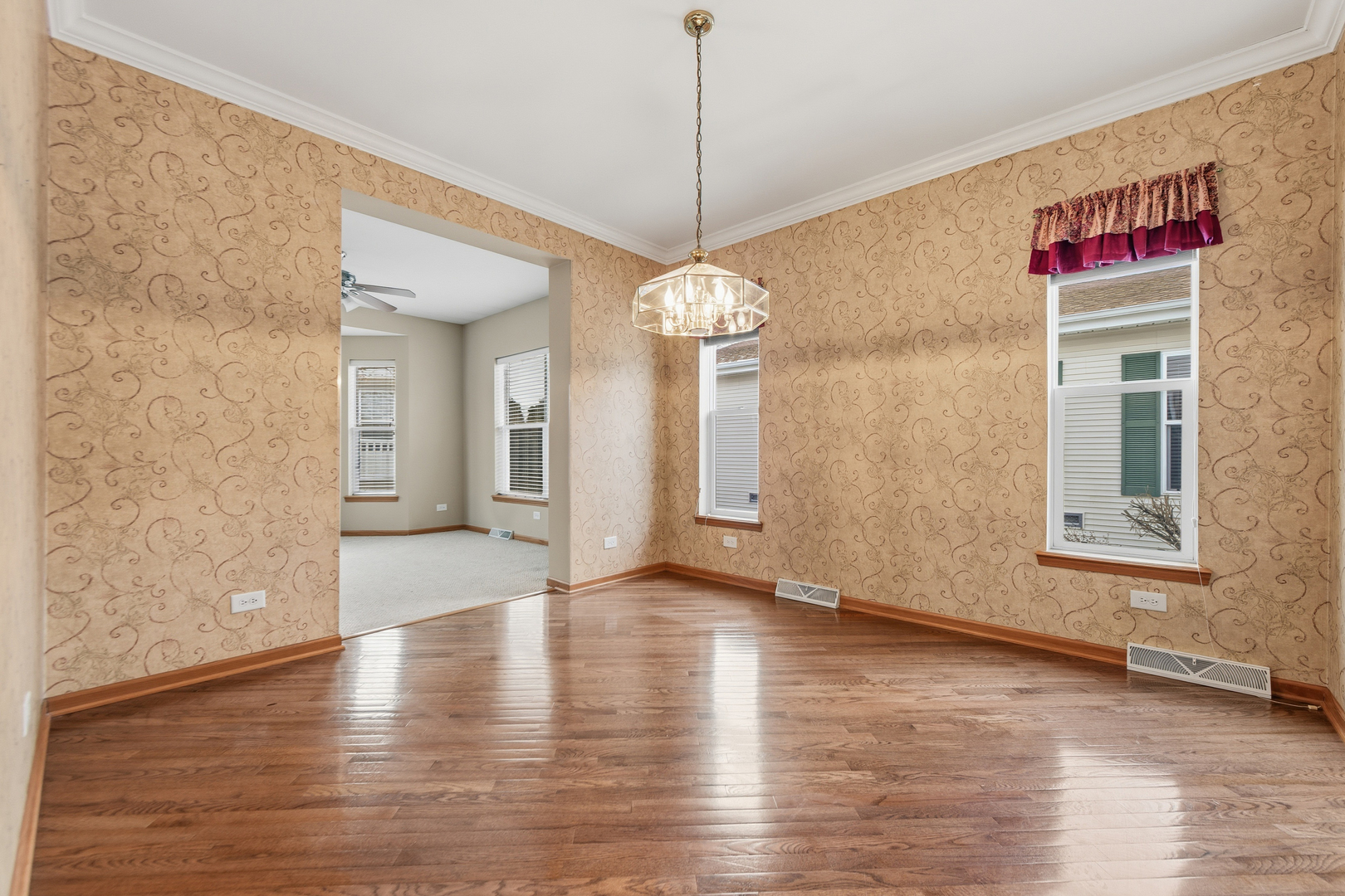 102 Hitching Post Lane Grayslake, IL 60030 - Photo 39 of 58 a view of a room with window and wooden floor