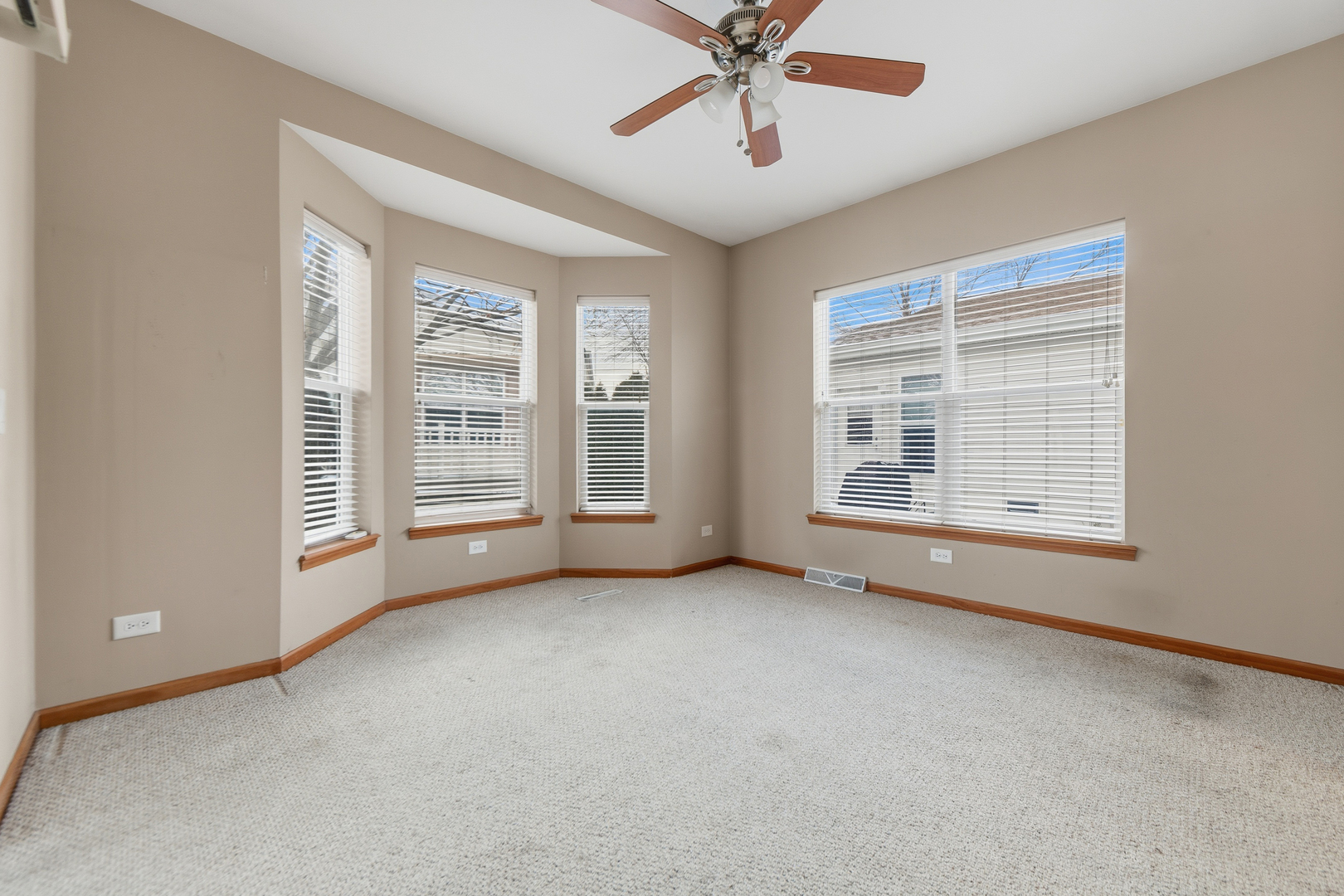 102 Hitching Post Lane Grayslake, IL 60030 - Photo 51 of 58 a view of an empty room with a window