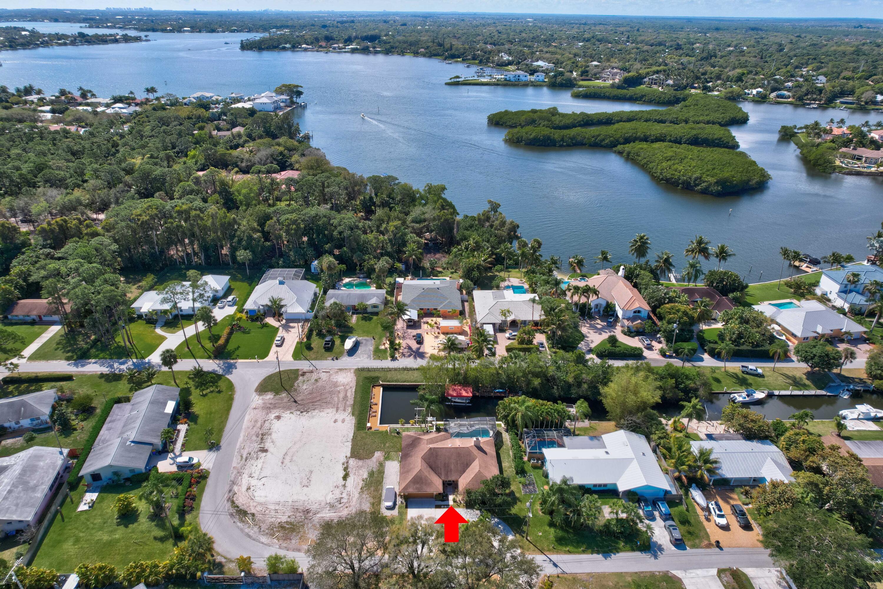 9524 Southeast Cove Point Street Jupiter, FL 33469 - Photo 1 of 58 Aerial looking south
