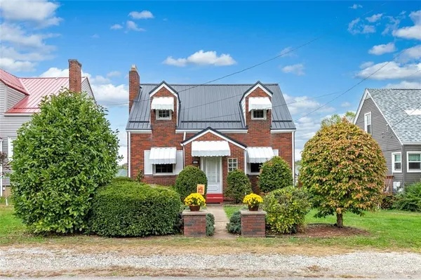 a front view of house with yard