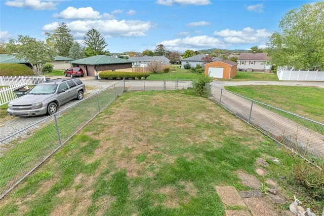 a view of an outdoor space and a yard