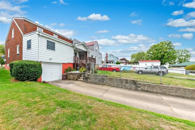 a view of street with parked cars