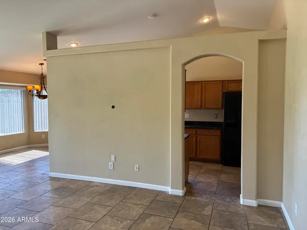 a view of a room with a fan and a fan