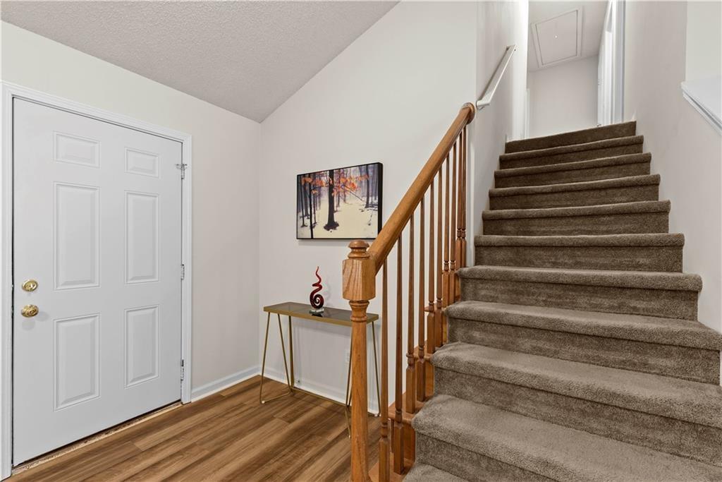 1700 English Ivey Lane Kennesaw, GA 30144 - Photo 11 of 29 a view of entryway and hall with wooden floor