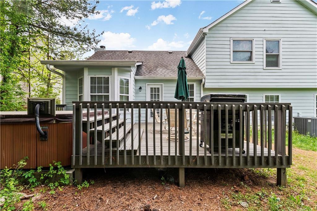 1700 English Ivey Lane Kennesaw, GA 30144 - Photo 27 of 29 a front view of a house with a garden
