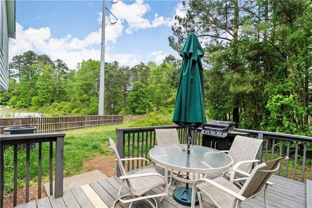 a view of a balcony with furniture