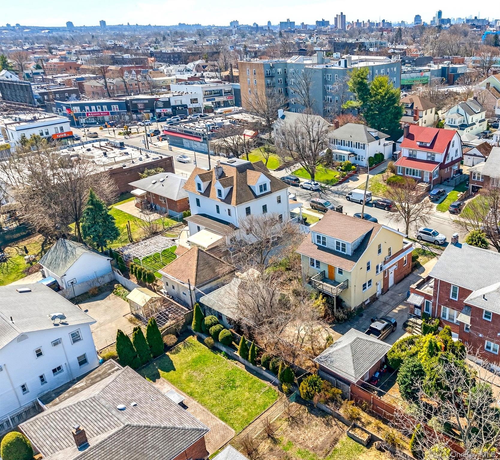 35-71 162nd Street Queens, NY 11358 - Photo 7 of 11 an aerial view of a houses with a swimming pool