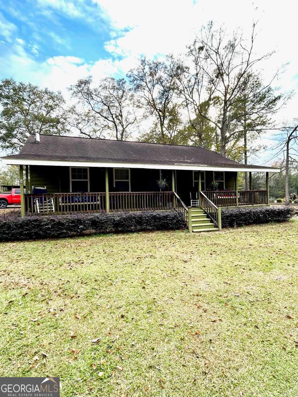 1902 East River Road Baxley, GA 31513 - Photo 1 of 1 a front view of a house with a yard