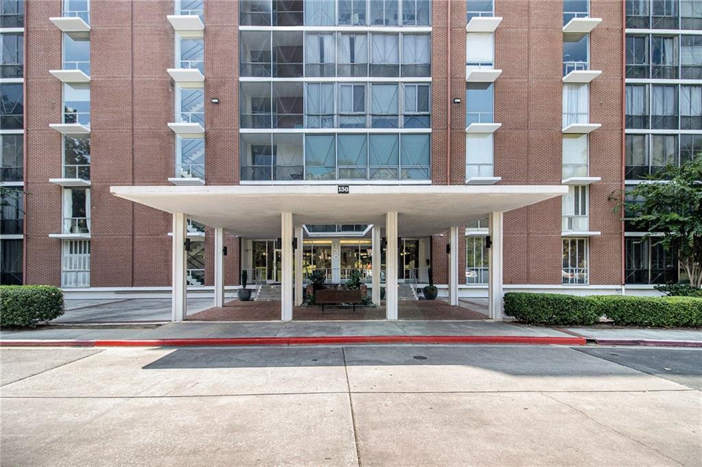 a view of a building with a street