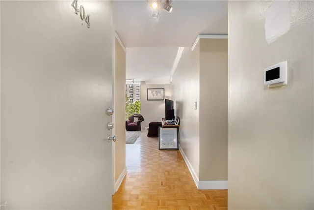 a view of a living room with windows