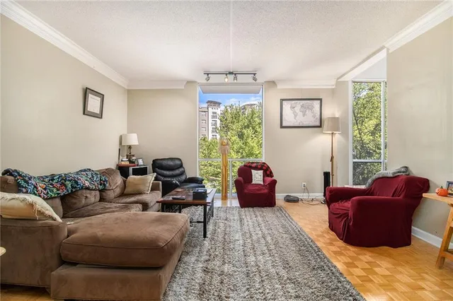a living room with furniture or couch and a window