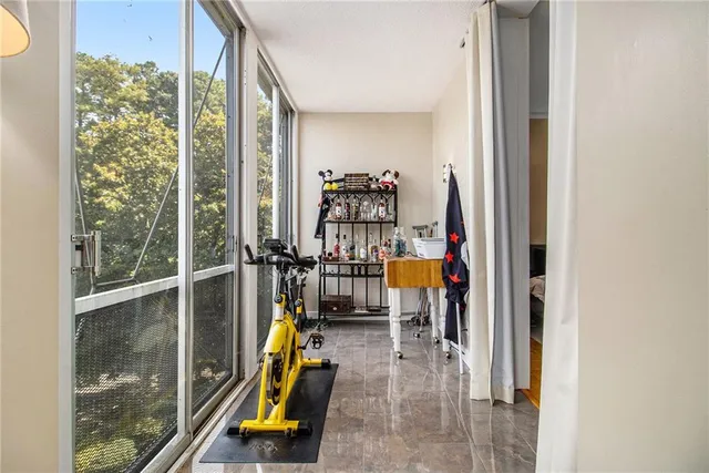 a view of a living room with furniture