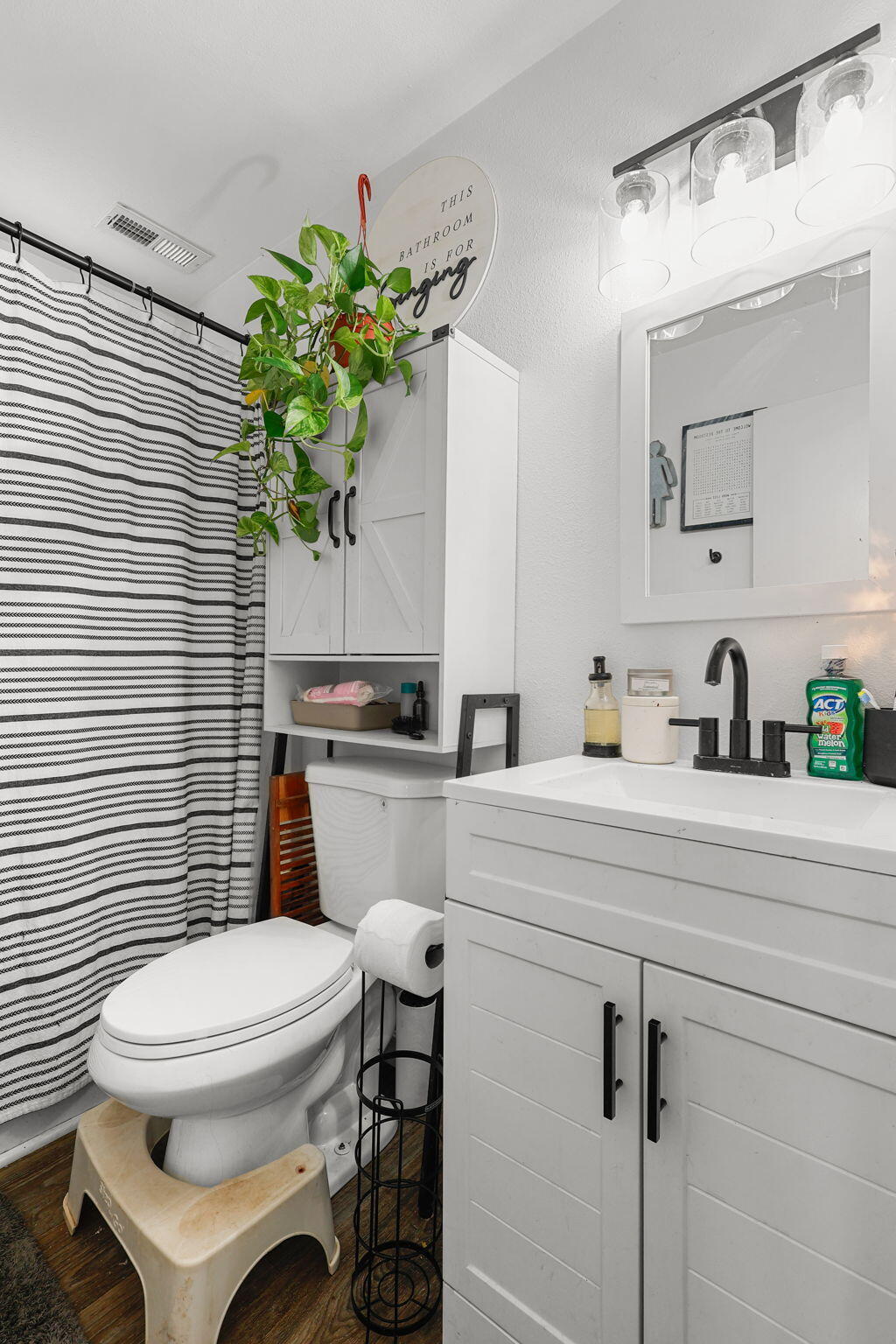 28093 Highway 44 Shingletown, CA 96088 - Photo 17 of 42 a bathroom with a sink toilet and mirror