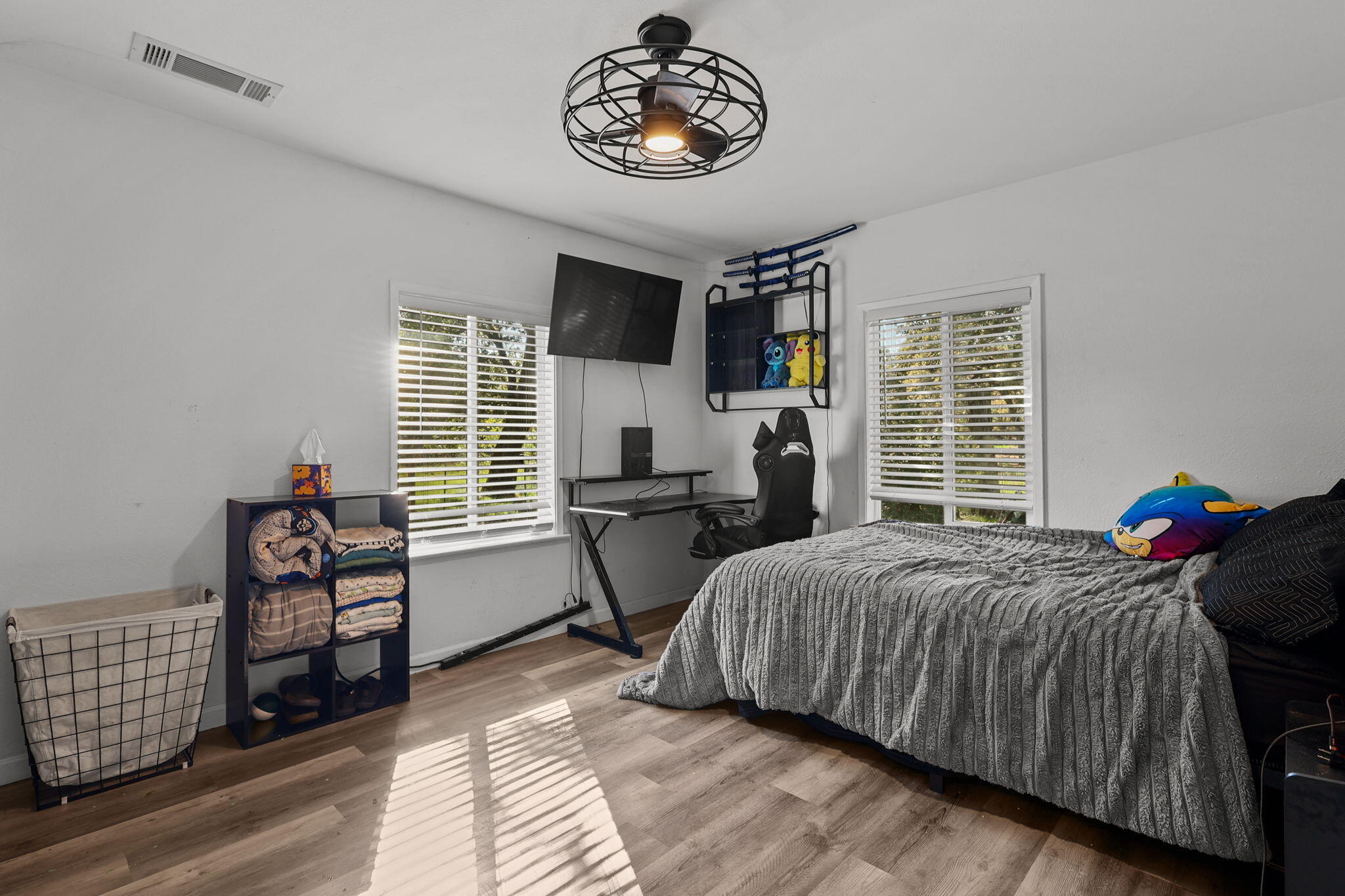 28093 Highway 44 Shingletown, CA 96088 - Photo 18 of 42 a bedroom with bed and windows