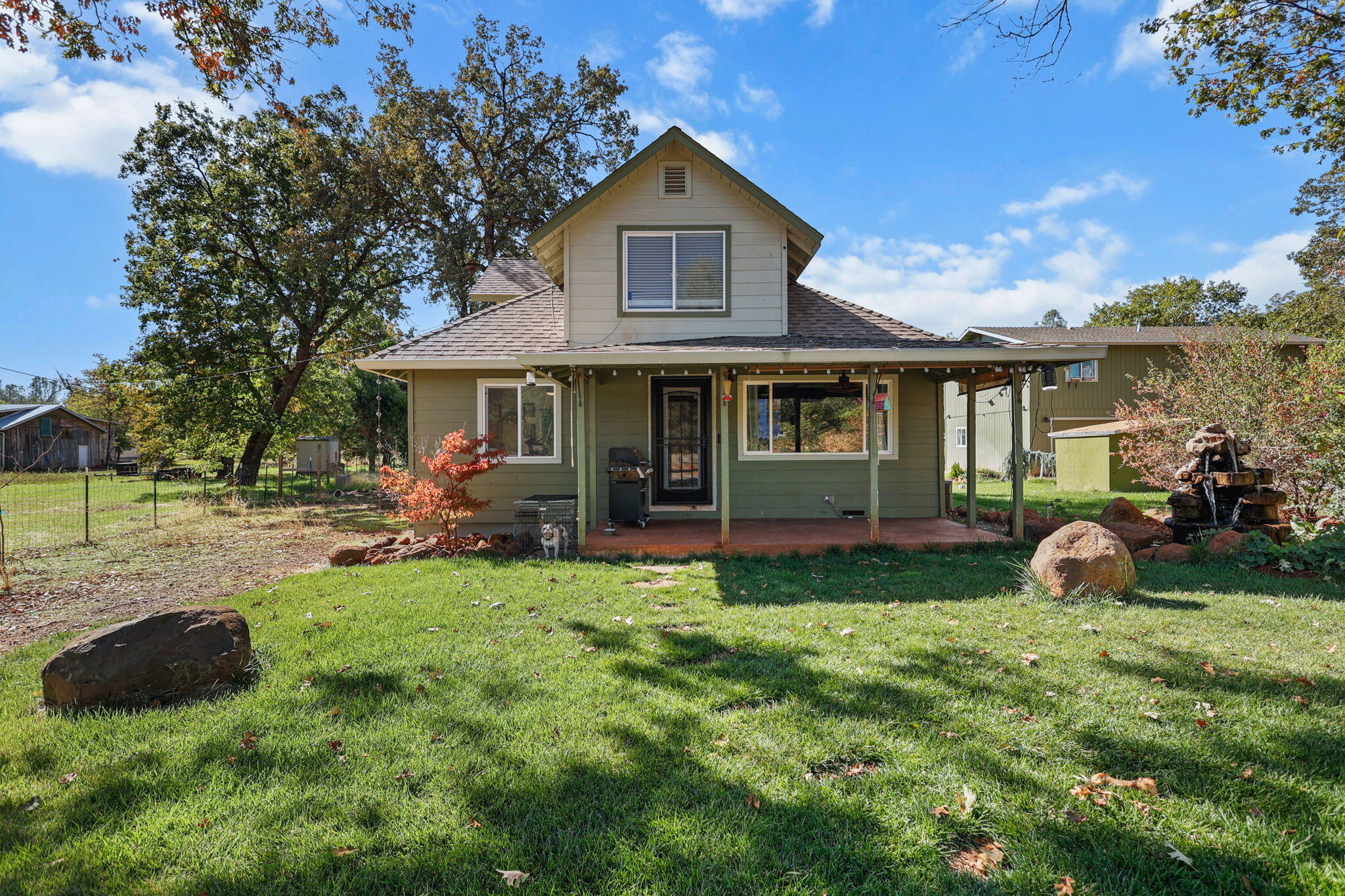 28093 Highway 44 Shingletown, CA 96088 - Photo 2 of 42 a view of a house with a yard and sitting area