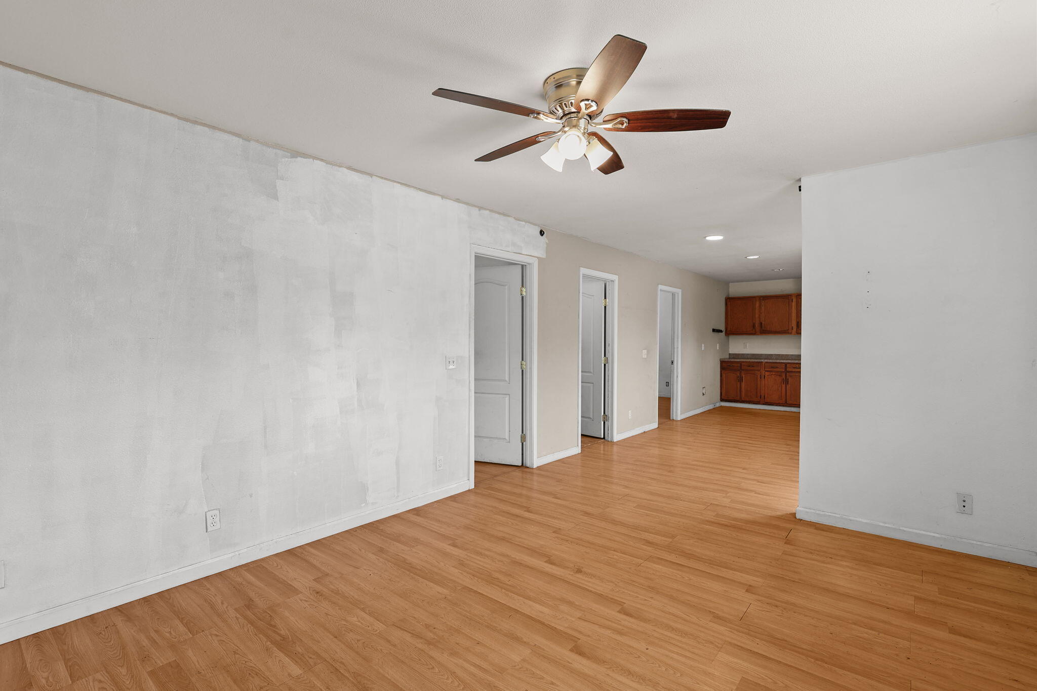 28093 Highway 44 Shingletown, CA 96088 - Photo 23 of 42 a view of an empty room with a ceiling fan