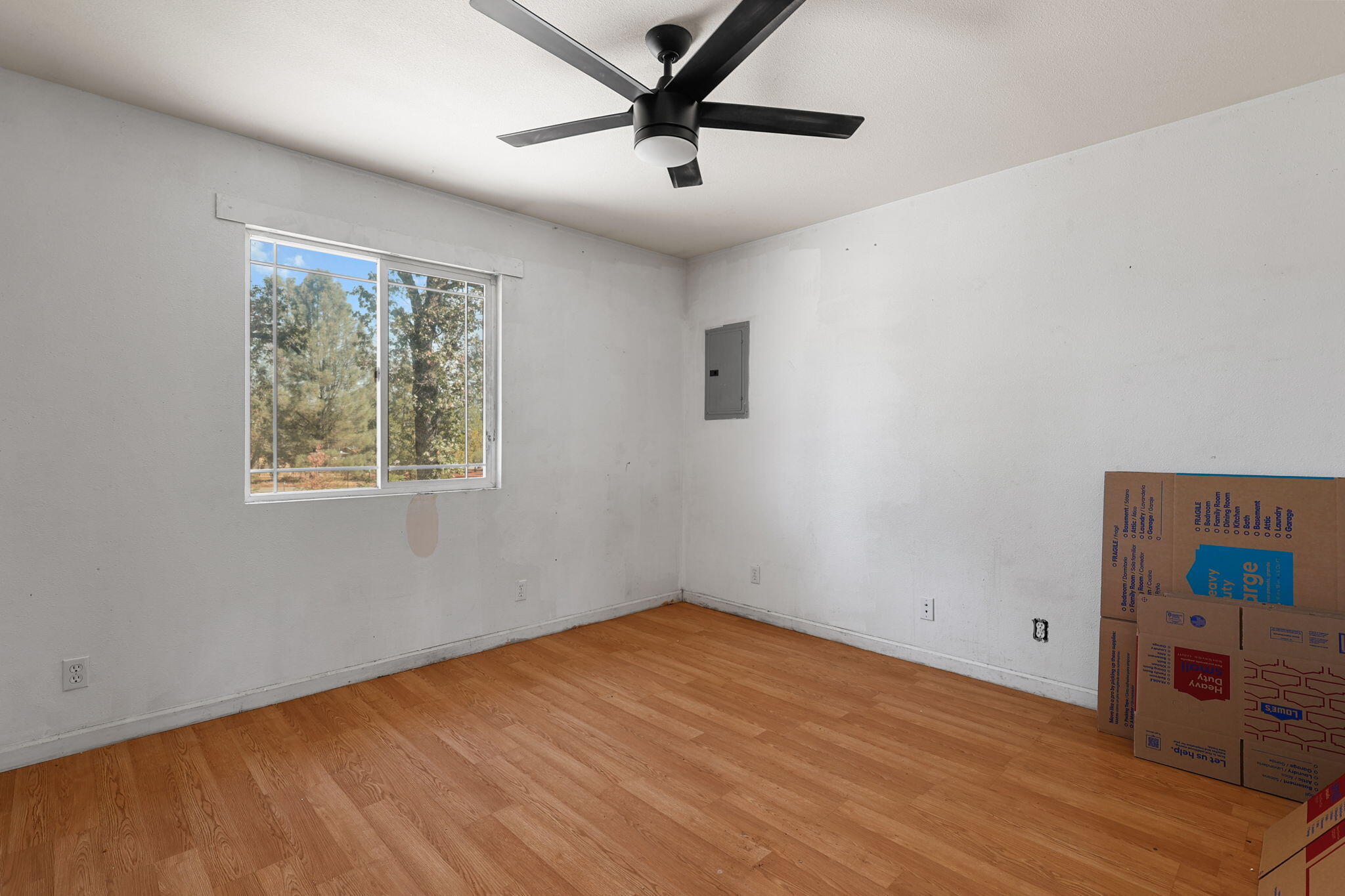 28093 Highway 44 Shingletown, CA 96088 - Photo 27 of 42 a view of an empty room with a window