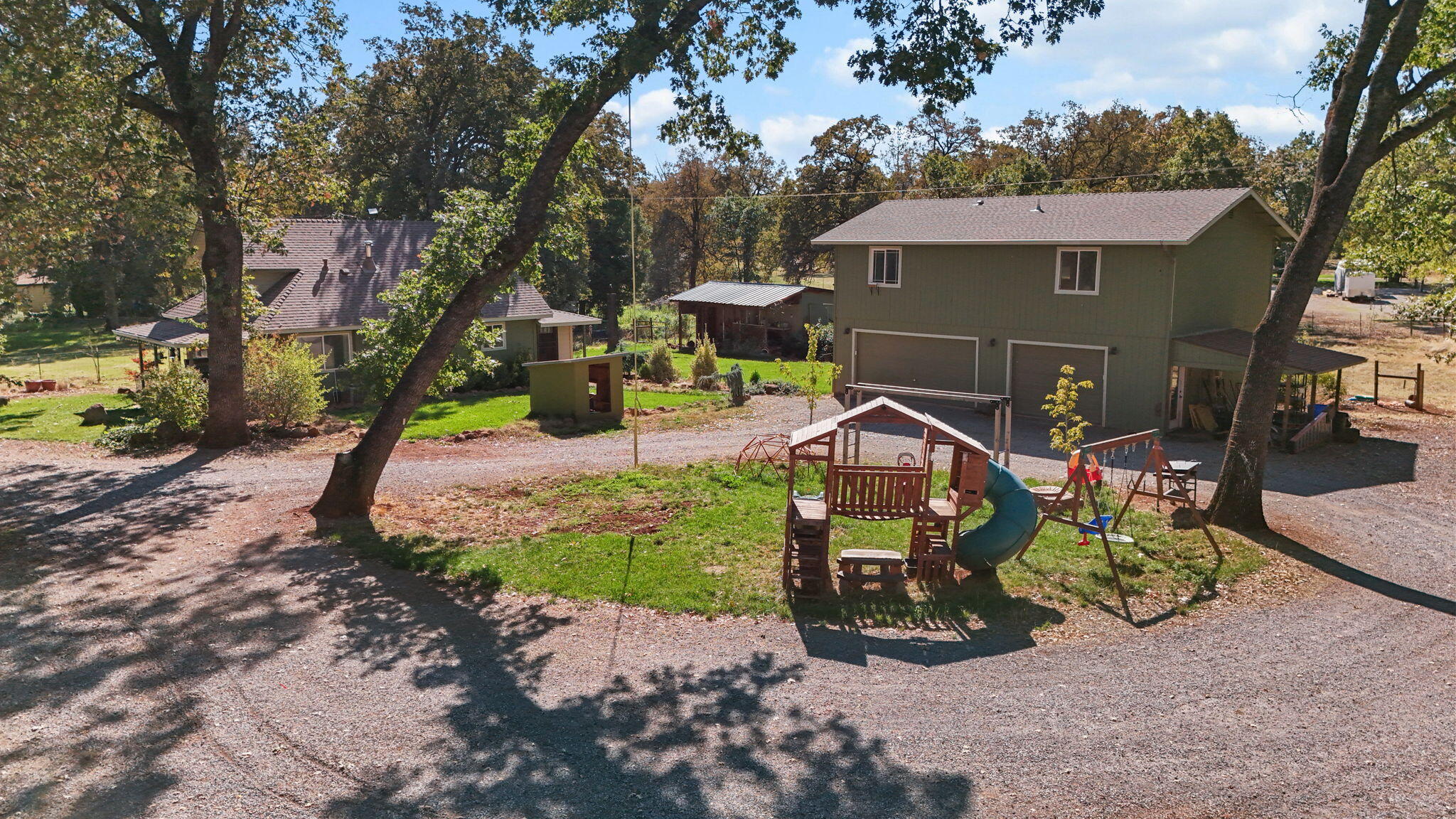 28093 Highway 44 Shingletown, CA 96088 - Photo 32 of 42 an outdoor space with seating area and trees around