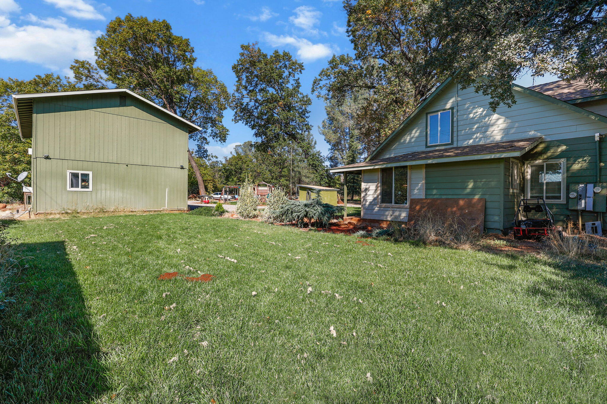 28093 Highway 44 Shingletown, CA 96088 - Photo 33 of 42 a front view of house with yard and trees