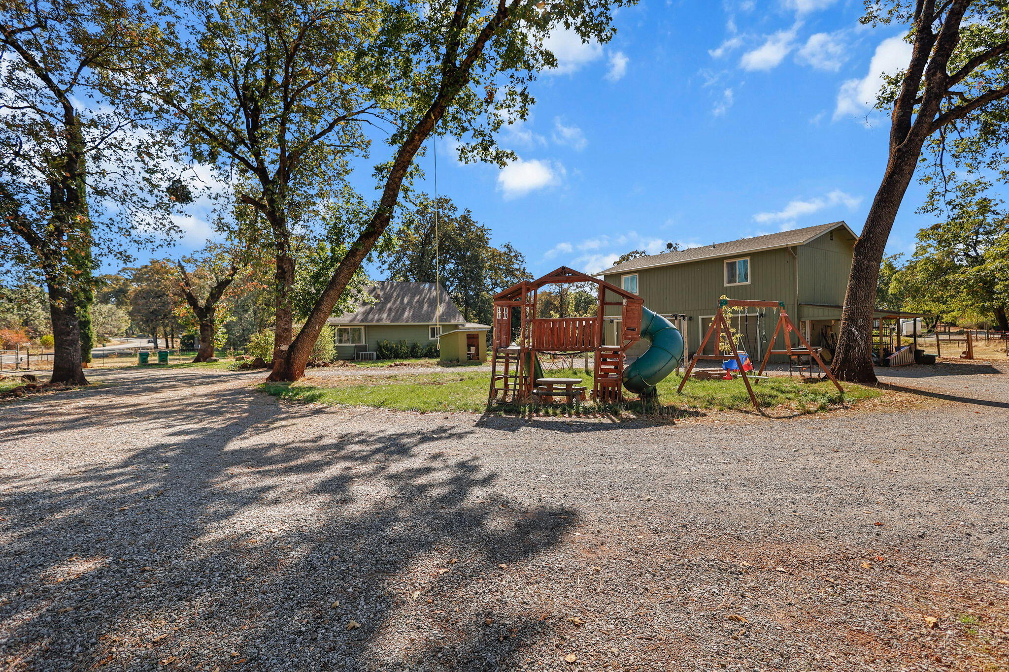 28093 Highway 44 Shingletown, CA 96088 - Photo 40 of 42 a view of a park with swings and slides
