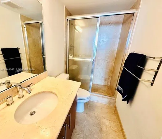 a bathroom with a tub and a sink