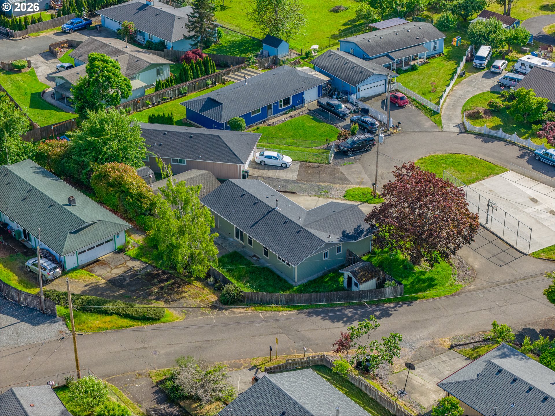1816 Sunset Court Myrtle Point, OR 97458 - Photo 16 of 42 an aerial view of a house with a swimming pool yard and outdoor seating