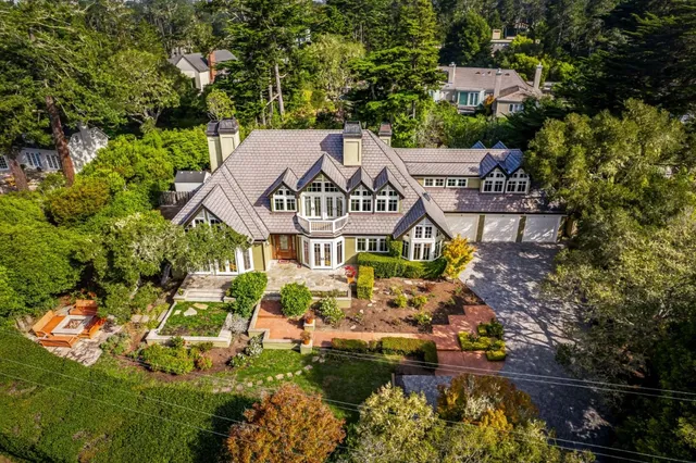 an aerial view of a house with a garden