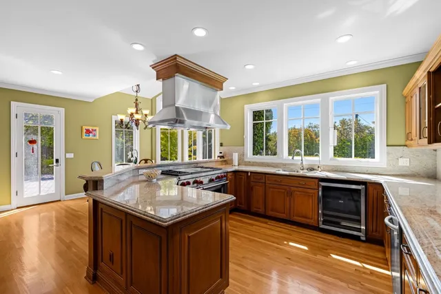 a kitchen with a stove and a sink