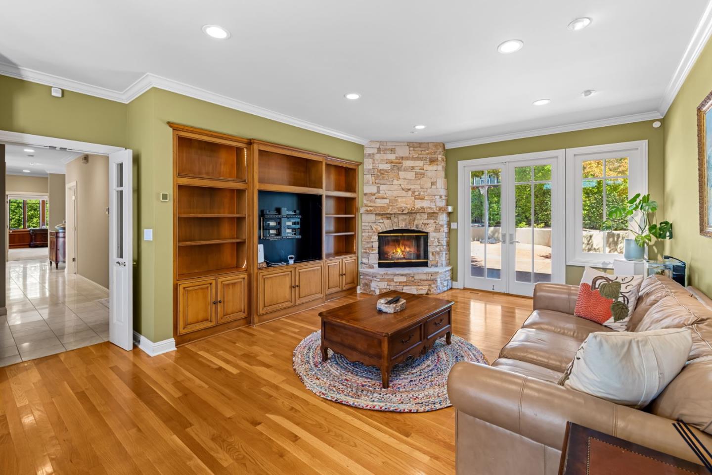 3937 Ronda Road Pebble Beach, CA 93953 - Photo 18 of 46 a living room with furniture fireplace and a large window