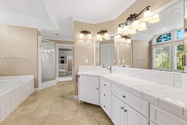 a bedroom with a bed and closet