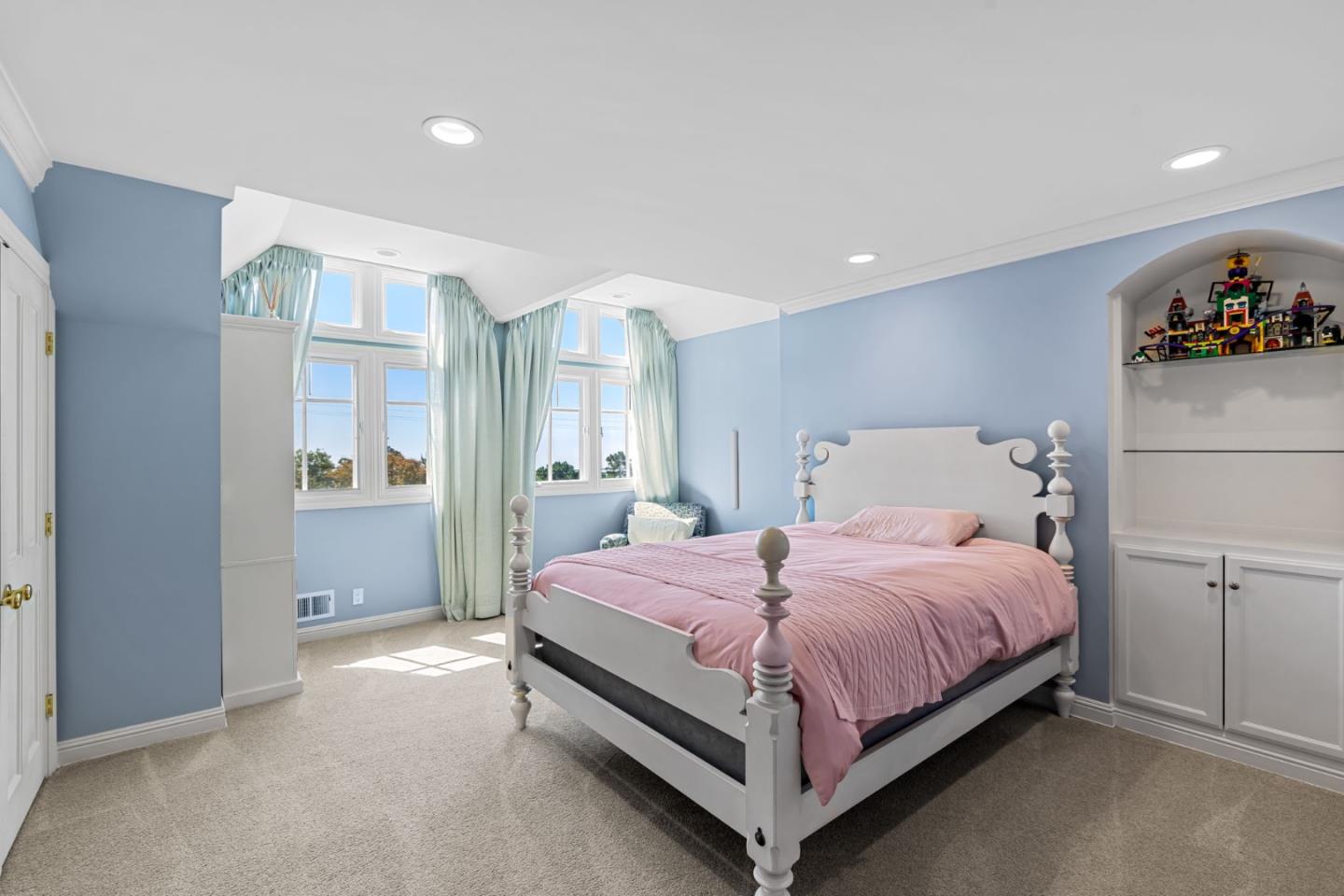 3937 Ronda Road Pebble Beach, CA 93953 - Photo 34 of 46 a bedroom with a bed and closet