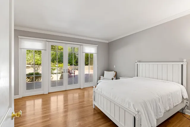 a view of an outdoor sitting area with a table and chairs