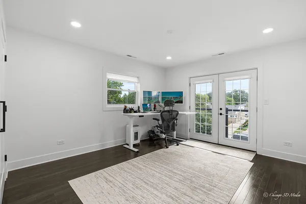 a living room with furniture a window and a table
