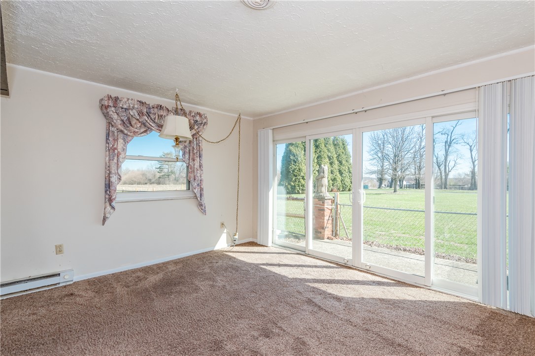 5760 Kitridge Road Dayton, OH 45424 - Photo 4 of 19 This bright space features a serene outdoor view
