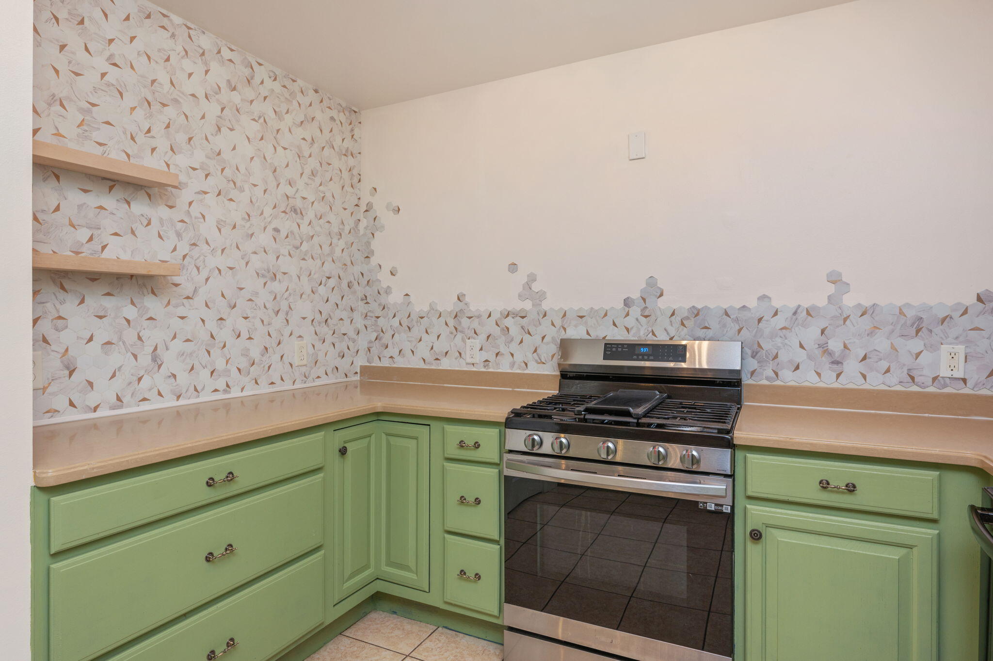 231 Seneca Trail Crestview, FL 32536 - Photo 13 of 39 a kitchen with a stove and a microwave
