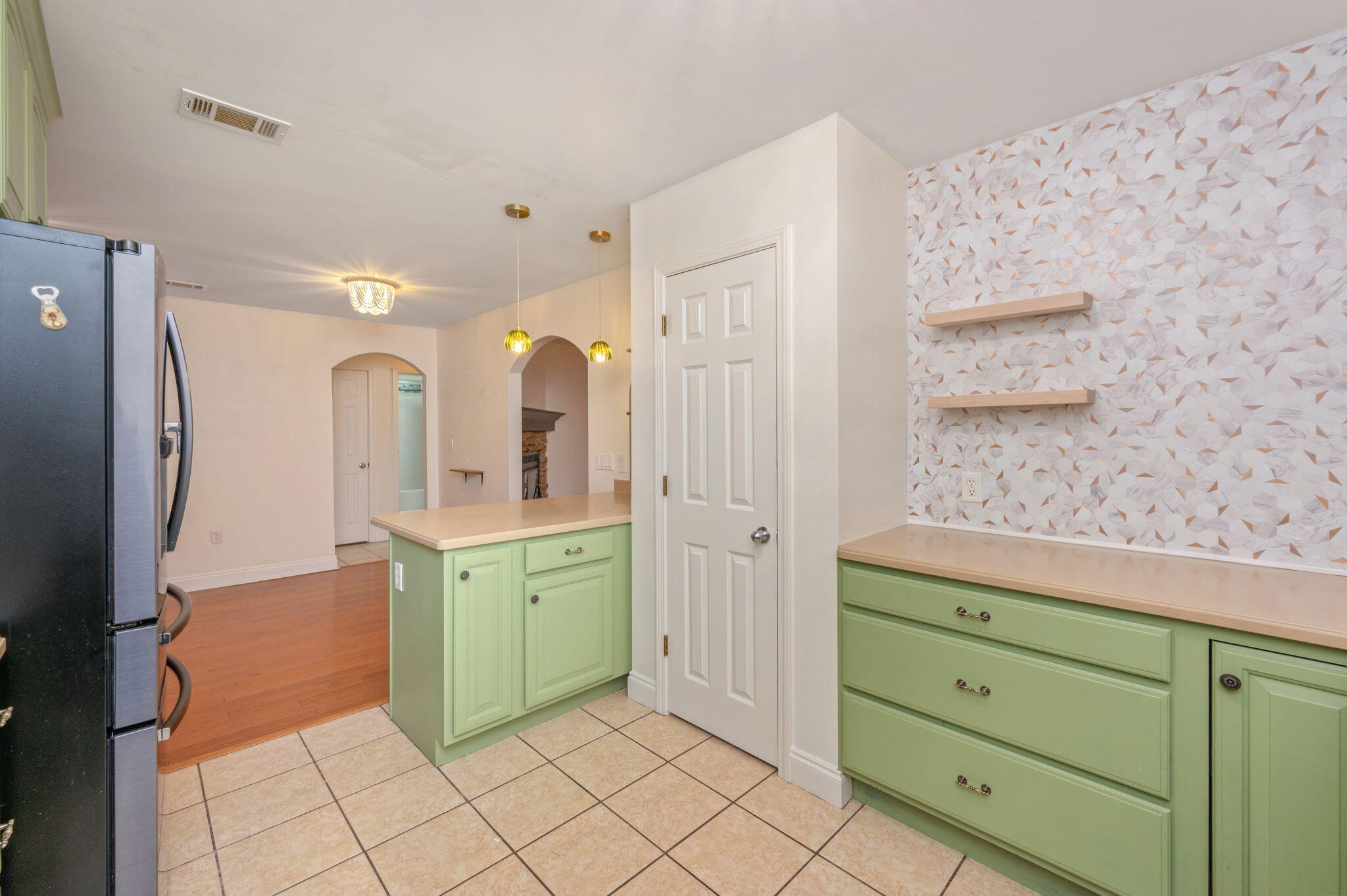231 Seneca Trail Crestview, FL 32536 - Photo 15 of 39 a spacious bathroom with a granite countertop sink mirror and shower