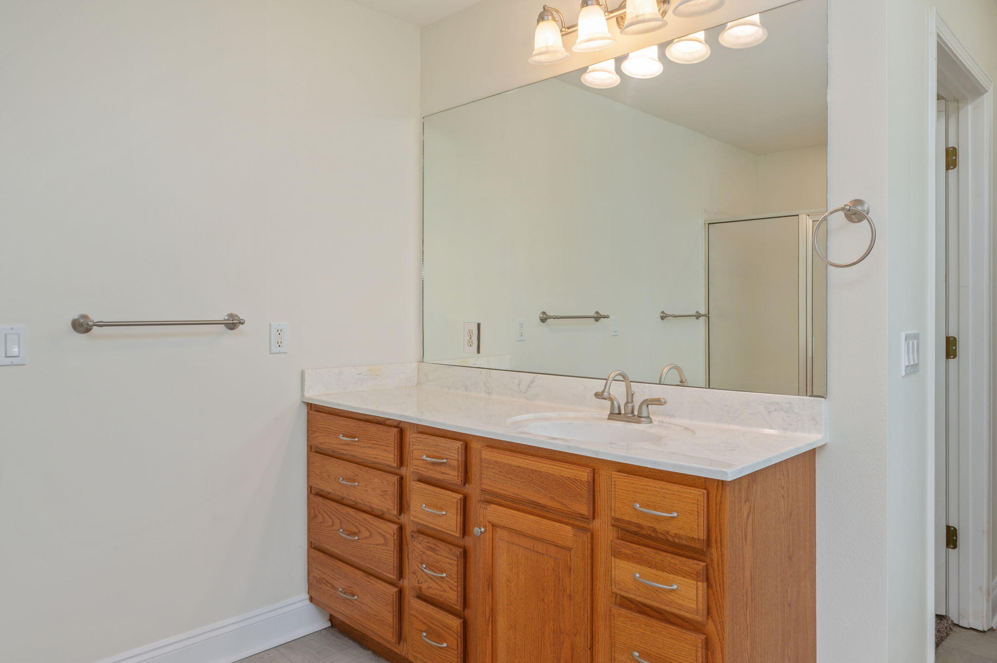 231 Seneca Trail Crestview, FL 32536 - Photo 21 of 39 a bathroom with a sink vanity and mirror