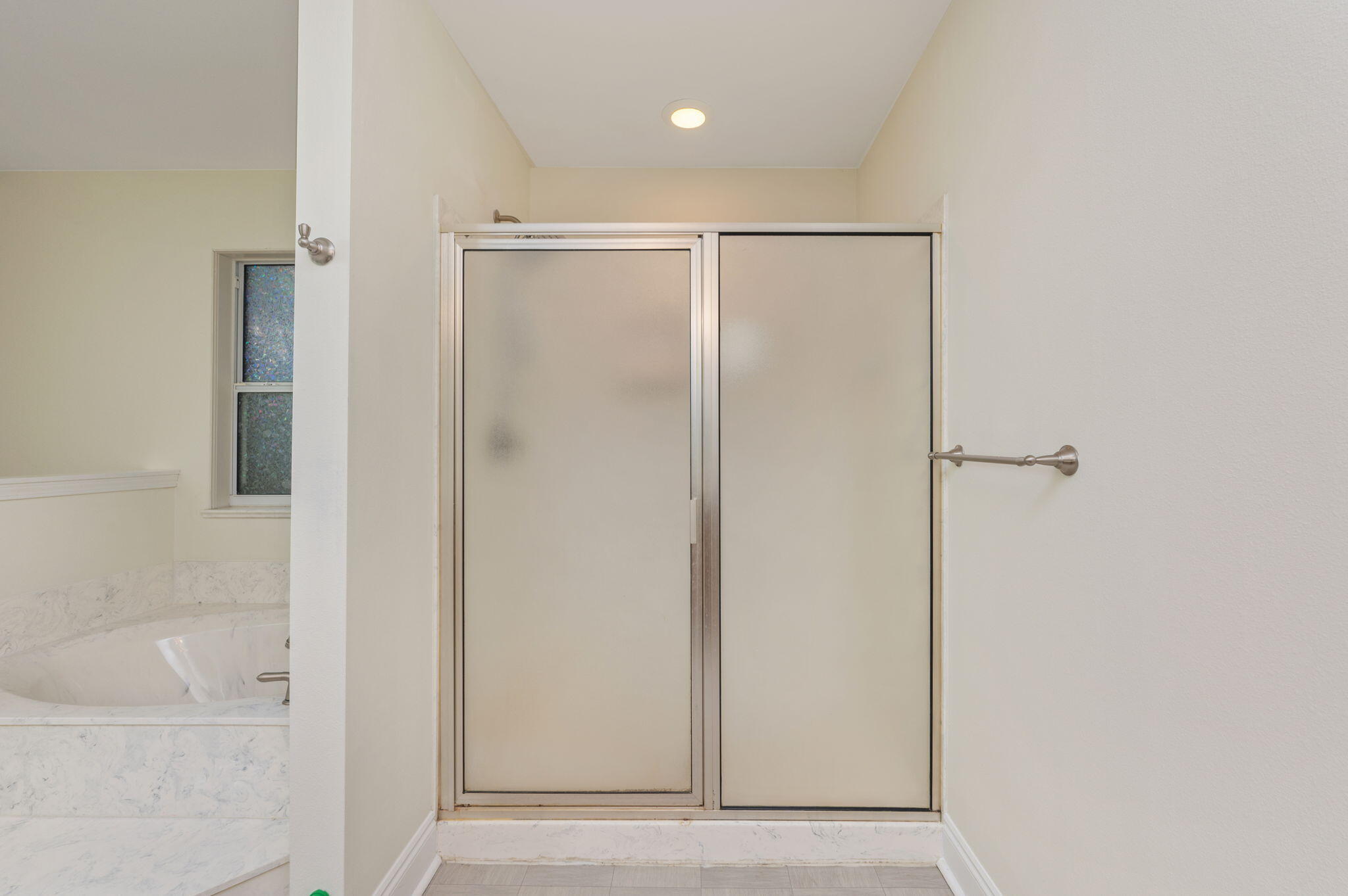 231 Seneca Trail Crestview, FL 32536 - Photo 22 of 39 a bathroom with a shower and a sink