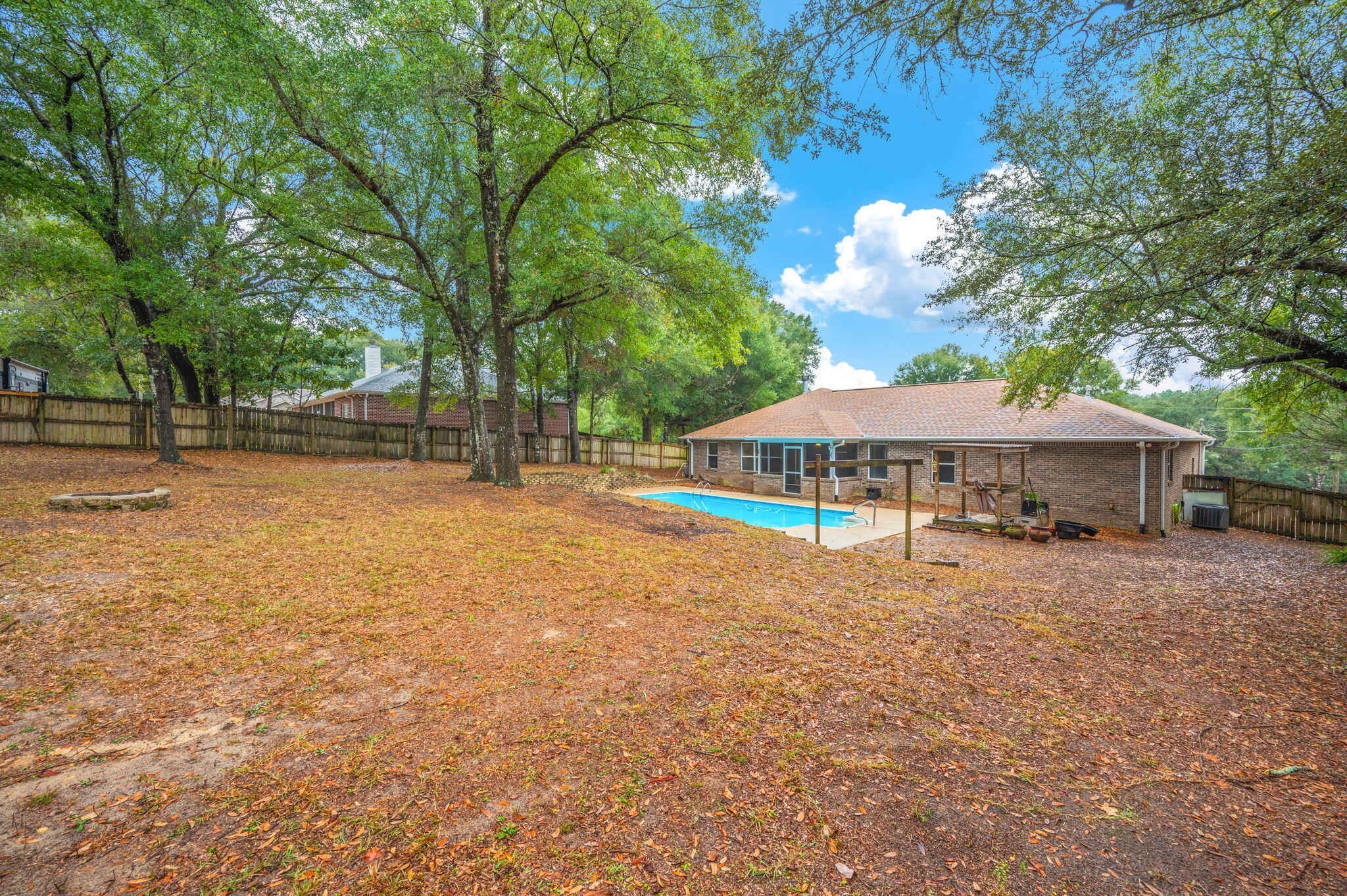 231 Seneca Trail Crestview, FL 32536 - Photo 36 of 39 a house view with a garden space