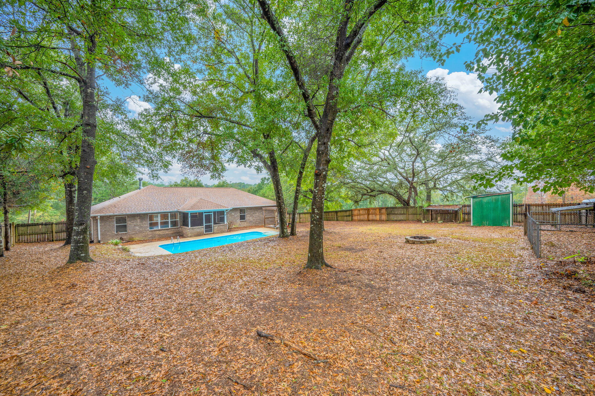 231 Seneca Trail Crestview, FL 32536 - Photo 37 of 39 a house with trees in the background