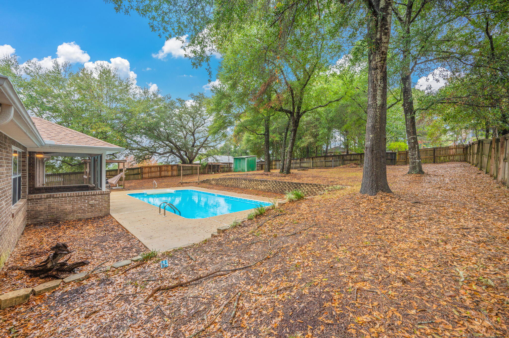 231 Seneca Trail Crestview, FL 32536 - Photo 38 of 39 a view of a house with backyard and trees