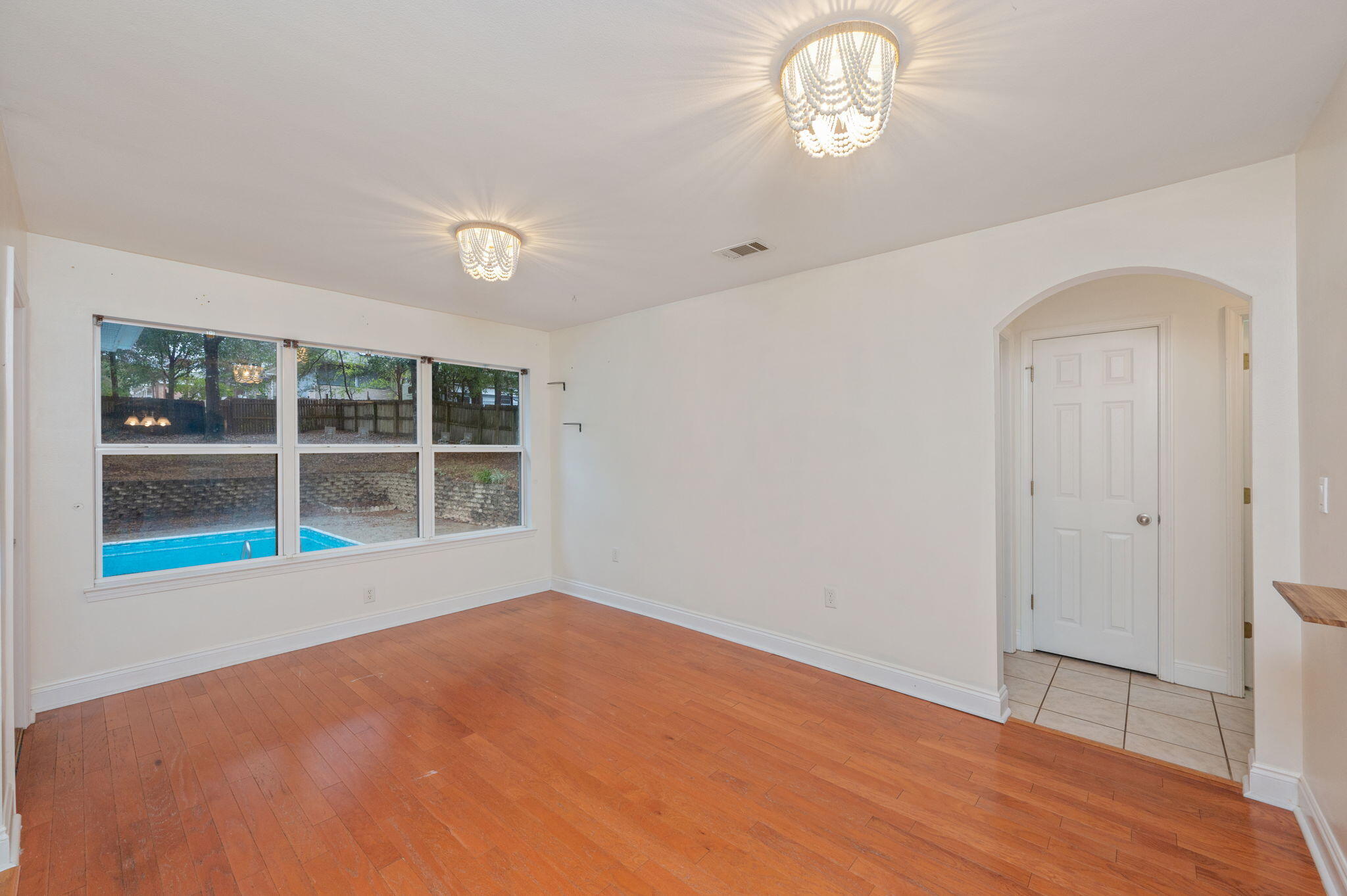 231 Seneca Trail Crestview, FL 32536 - Photo 8 of 39 a view of an empty room with a window