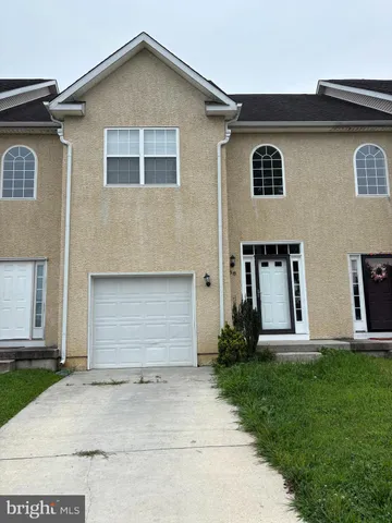 a front view of house with yard