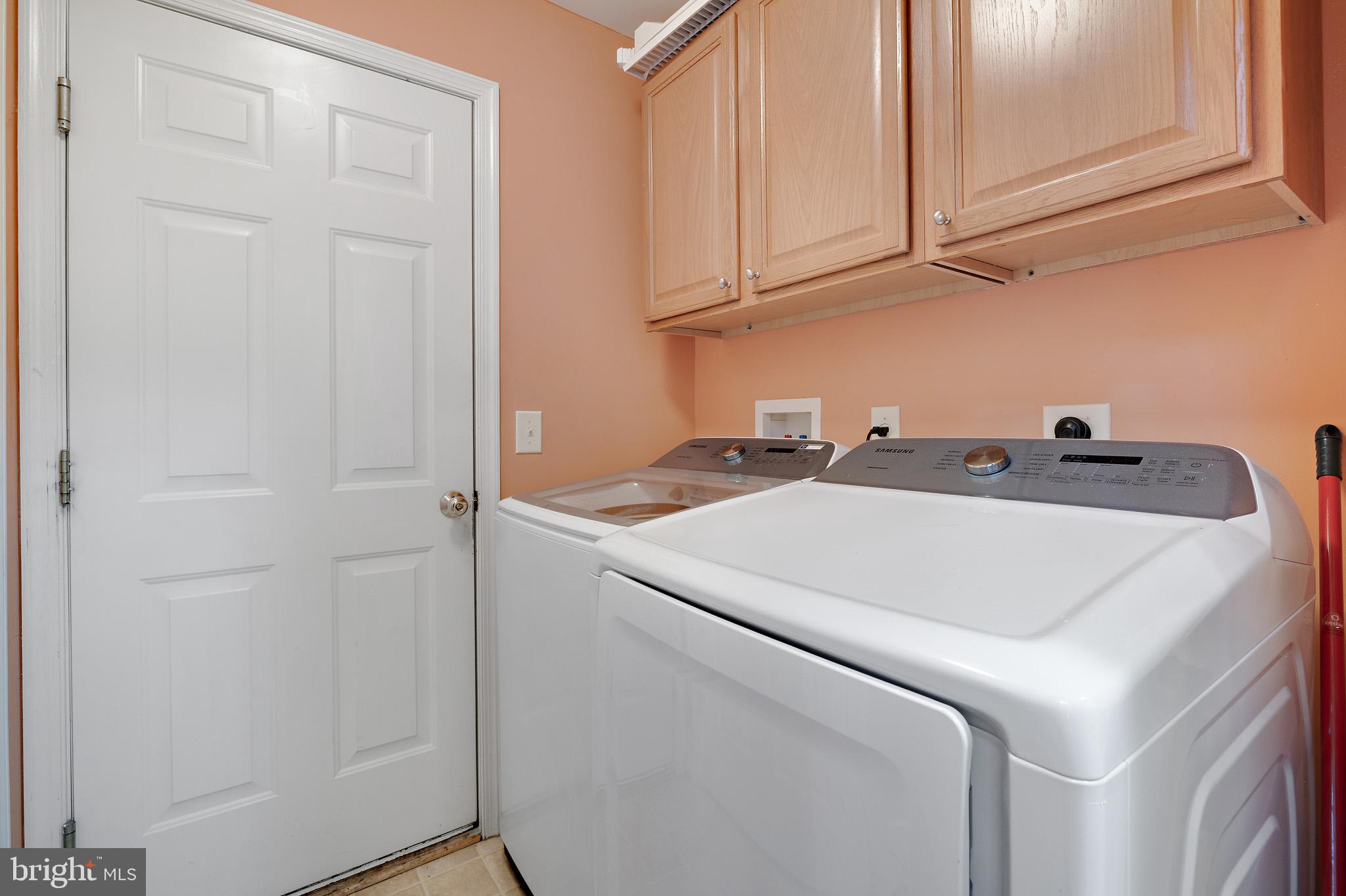 8008 Carlean Court Pasadena, MD 21122 - Photo 14 of 35 a utility room with dryer and washer